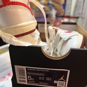 Jordan White and Red Sneakers Classic Athletic Design